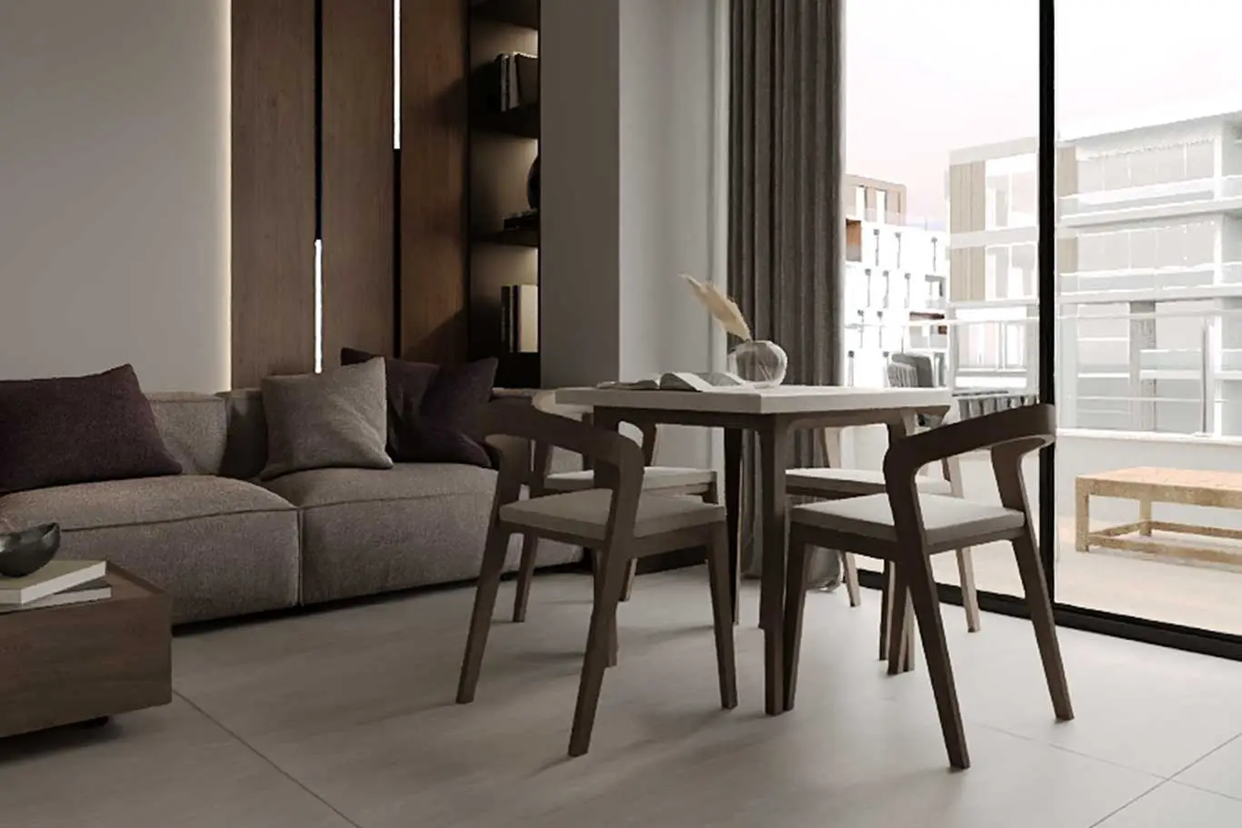 Modern hotel suite interior with dining area, comfortable sofa, and balcony view with natural light.