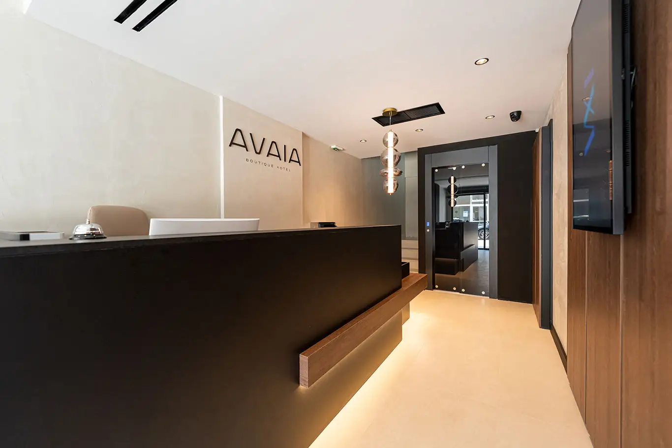 Wide view of the Avaia Boutique Hotel lobby and reception desk in Moudania